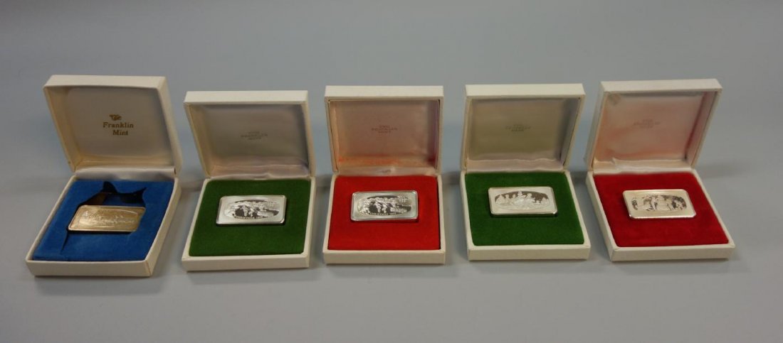 5 Sterling Christmas Ingots, Franklin Mint: A group of five solid sterling silver Christmas ingots. (1000 grains silver). Manufactured by the Franklin Mint. Comprised of one ingot from 1971, two ingots from Christmas 1972, one from 1973 &1974.