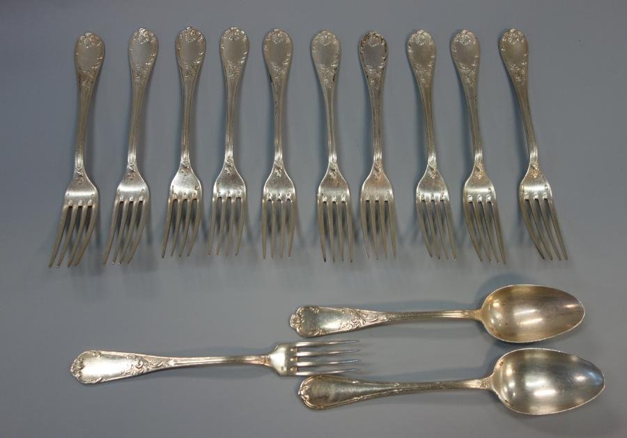 Christofle Marly Silver Plate Flatware: Christofle silverplate flatware, Marly pattern. Comprised of 10 large dinner forks (8.5" long-stylized monogram on the back tip). Together with 2 large tablespoons and 1 dinner fork of differing patte