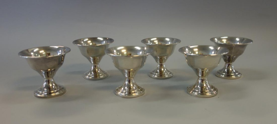 Set of 6 Sterling Silver Nut Cups: A set of six sterling silver nut cups. Each measuring 3.25" in diameter, 3" high. Weighted bases.