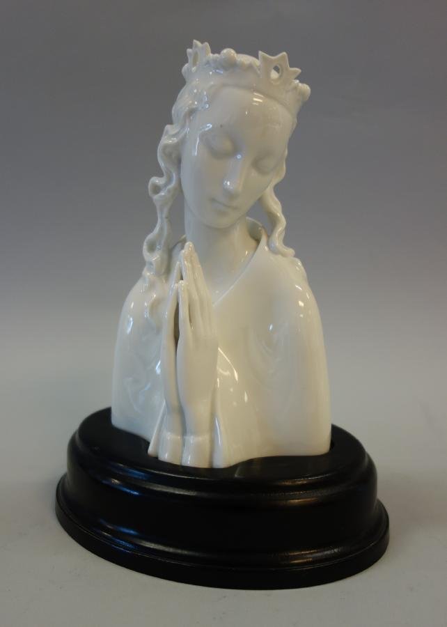 Augarten Porcelain Madonna, Vienna: An Austrian white porcelain figure of the Madonna in a Ray Wreath by Augarten Manufactory, designed 1933 by Ida Schwetz-Lehmann. Signed underfoot and with impressed numerals, 1715 / 1. Measures 6.75" 