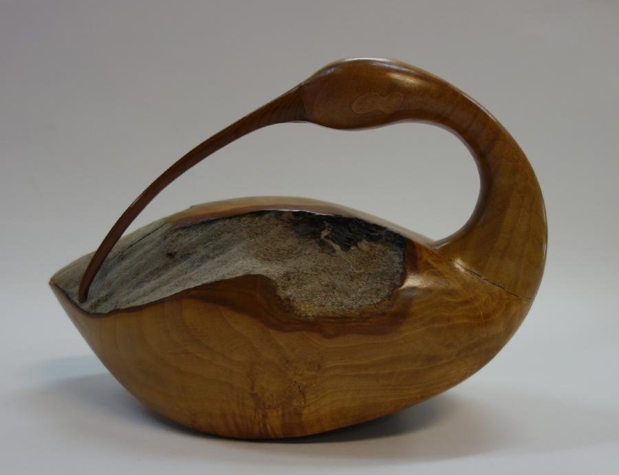 David W. Morin, Decoy, Ibis Shorebird: A hand carved decoy by New England wildfowl carver David W. Morin, Hudson MA. The Ibis shorebird is carved from Madrone Yew, dated April 85 and signed Morin. Measures 11.5" long, 5.25" wide, 7.25" hig