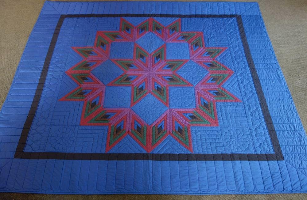 Amish Quilt, Hand Stitched Star Pattern: An Amish Quilt. Cotton quilt, hand-sewn / stitched star pattern. Quilted panels of hearts and flowers on both sides. Measures 9 feet x 8 feet. NOTE: the color is a deeper blue than the photos suggest.
