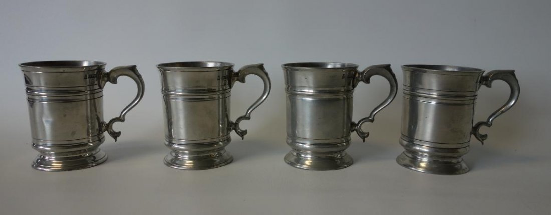 4 Pewter Tankard Mugs, Walter Perry, 19th century: A set of four pewter 1 pint tankards / mugs by Walter Parry, 19th century. Each stamped with the maker's name and with a crown over VR and the numerals 396. Indistinct wording underfoot. Measuring 5"
