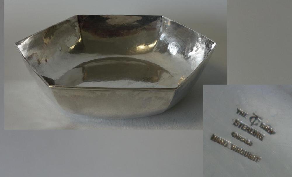 The T. C. Shop Chicago, Sterling Serving Bowl: A sterling silver bowl by the T.C. Shop, Chicago (1910-1913) Emery Todd and Clemencia Coscio. Six-sided hexagonal serving bowl with slight hand-hammering. Measures 9.5" across x 8.5" x 2.25" high. The