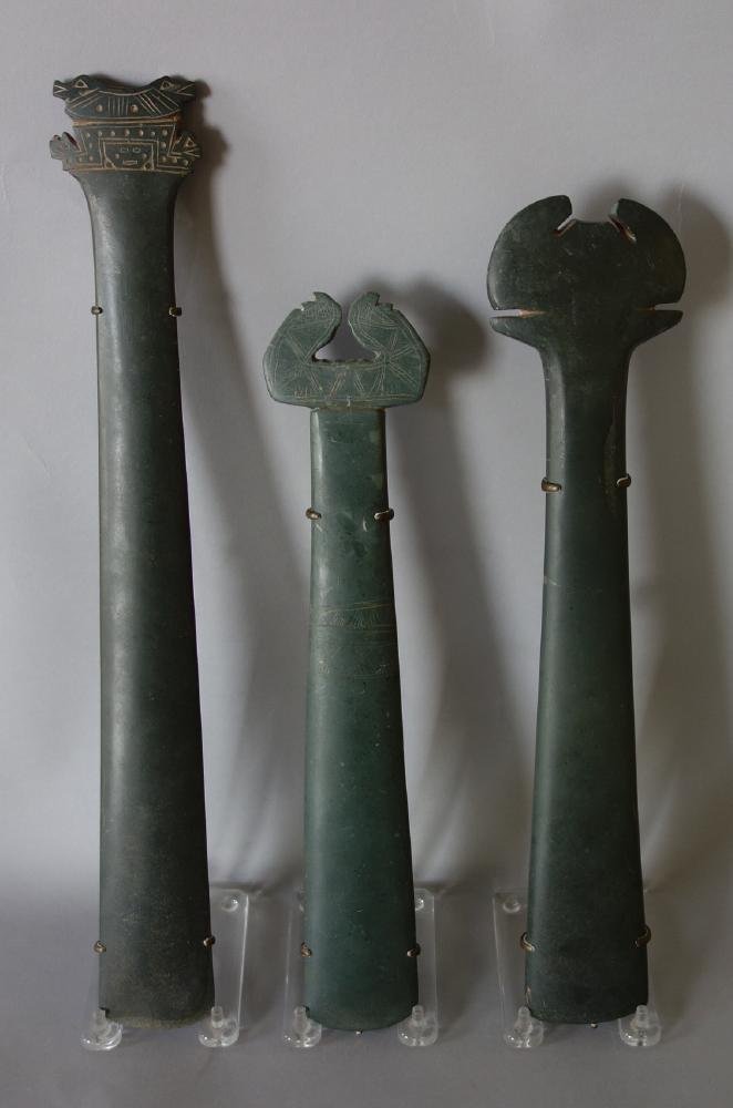 3 Rare Tairona Stone Scepters, c.700-1500 AD: A set of three highly rare and important Pre-Columbian green stone scepters / staffs. Colombia, Tairona culture, Santa Marta, c.700-1500 AD. Each with tapering blade, decorated butt and a slate green 