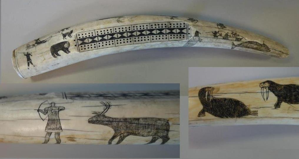 23" Antique Scrimshawed Walrus Tusk Cribbage Board: An exceptionally large antique Eskimo / Inuit carved walrus tusk storyboard, formed as a cribbage board. Late 19th / early 20th century. Measures 23" long, 3" wide, 1.5" deep. Fine scrimshaw depiction