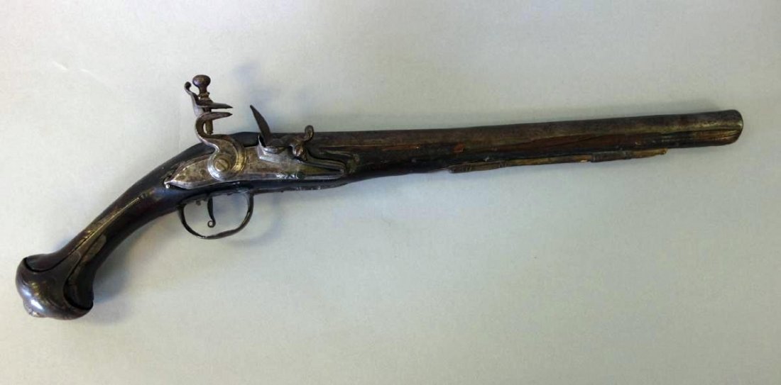 Antique Spanish Flint Lock Pistol, Persian Trade: An Antique Spanish / Continental flint lock pistol, c.1780s-1815. Possibly made for the Persian Trade. Measures 20" long. See photos for condition.