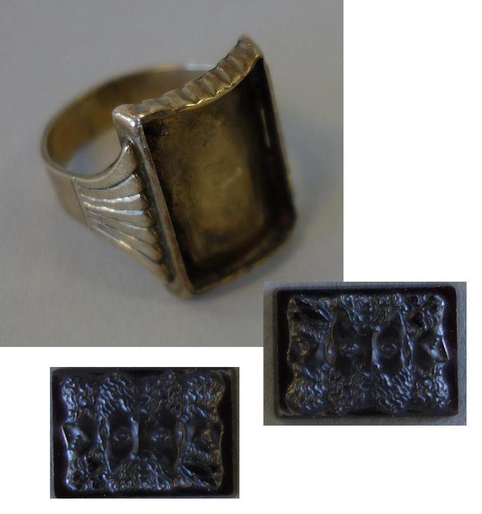 Bacchus Intaglio & 10K Gold Ring: A rectangular intaglio depicting Bacchus, the Roman god of wine and intoxication. The intaglio decorated with a front-on portrait of Bacchus, flanked on each side by his profile. The portrait can be v