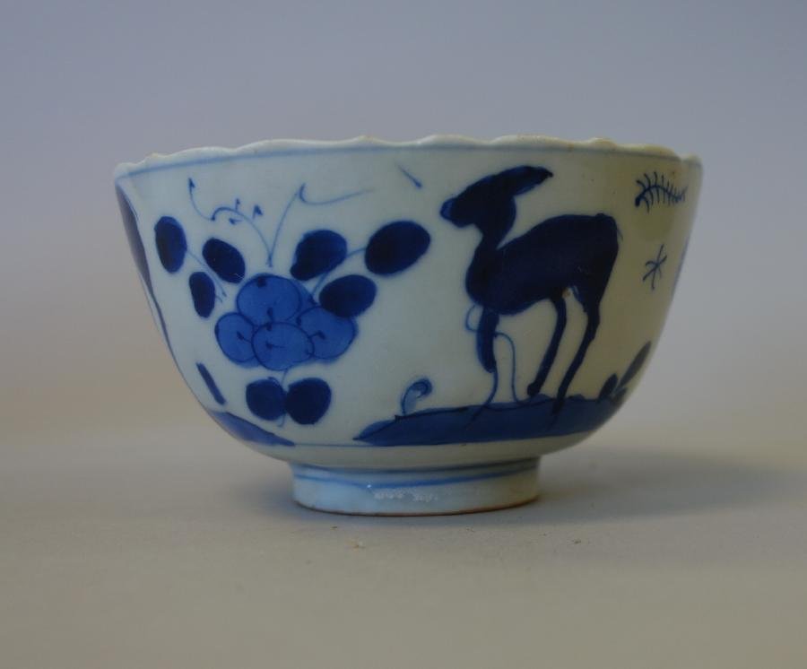 Chinese Blue & White Porcelain Tea Bowl, Ming Mark: A Chinese blue and white porcelain tea bowl. The underside bearing a six-character mark in underglaze blue, denoting Ming Dynasty, Chenghua reign. Scalloped edge bowl decorated with a deer / stag with