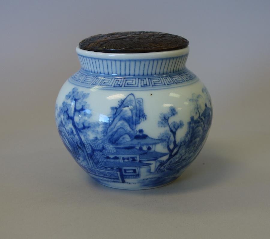 Japanese Blue & White Porcelain Jar, Signed: A Japanese blue and white porcelain jar. In the Chinese taste. Signed underfoot with 2 character calligraphy. Fine underglaze blue decoration depicting figures and a tea house within a lake landscape 