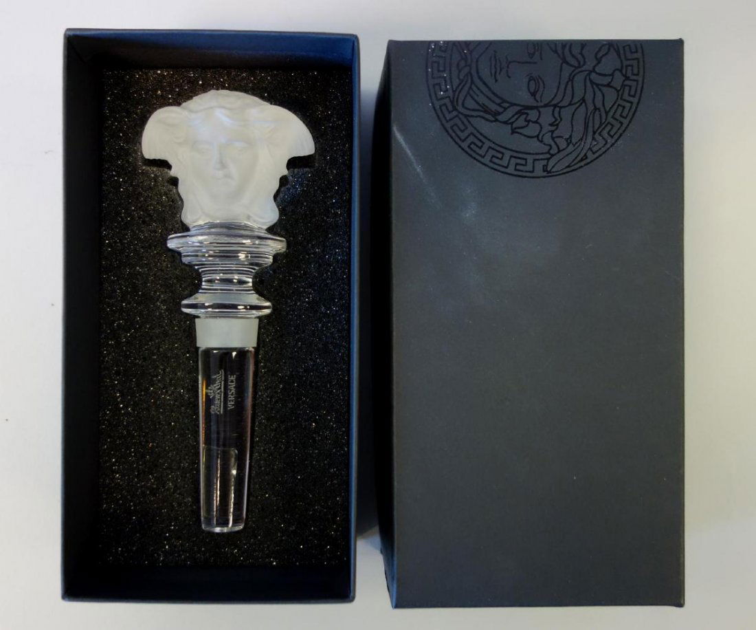 Versace for Rosenthal Crystal Bottle Stopper & Box: A crystal bottle stopper by Versace for Rosenthal. Made in Austria. The top in frosted glass depicts on both sides, the face of Bacchus the wine god. Measures 5.25" high, 2-1/8" wide. Never used. Come