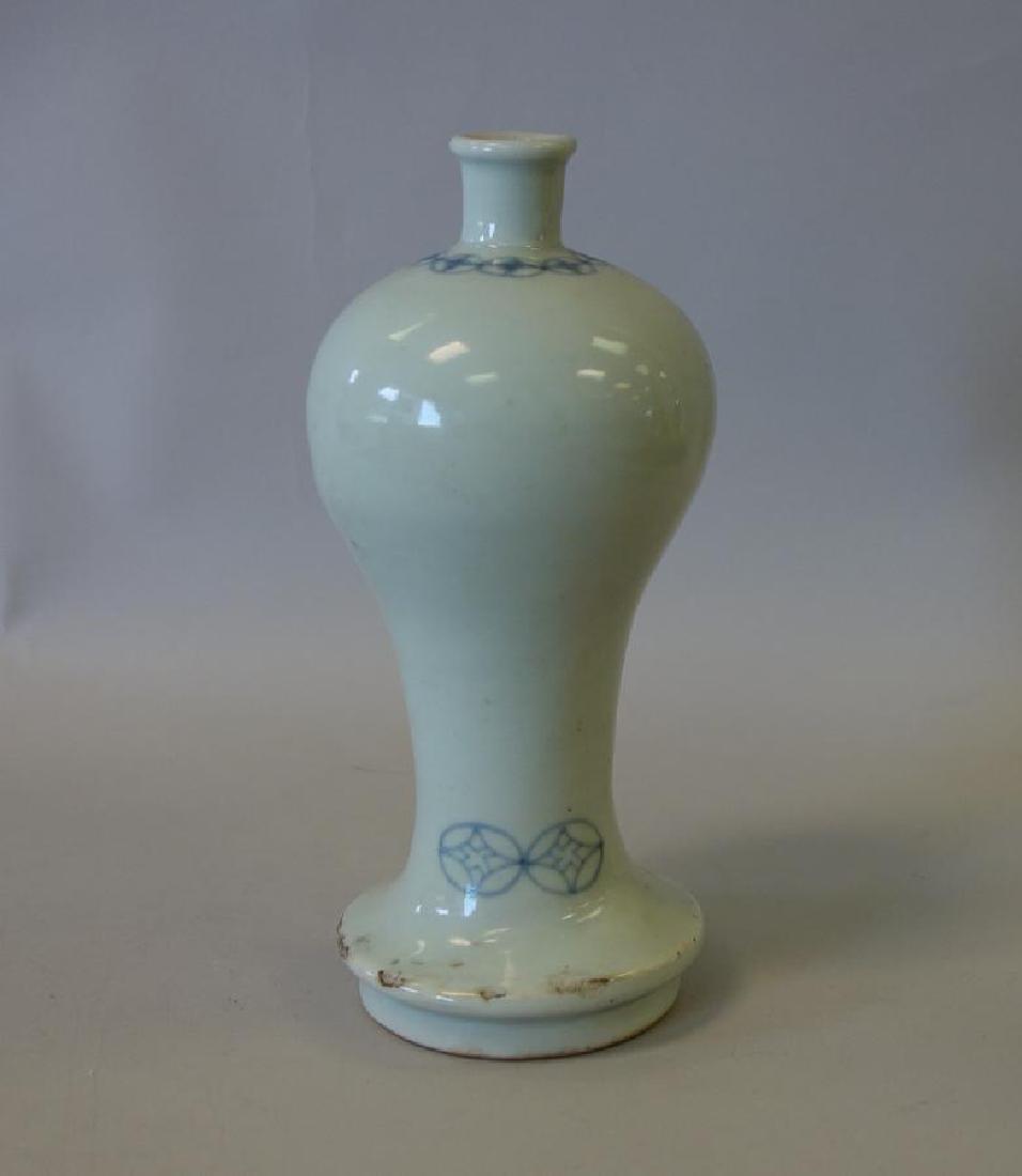 Chinese Song Style Porcelain Wine Bottle: A Chinese Song Style porcelain wine bottle / vessel. Baluster / gourd formed bottle, having underglaze blue decoration. Measures 7-5/8" high, 3.5" diameter. CONDITION NOTE: old roughage nicks at base,