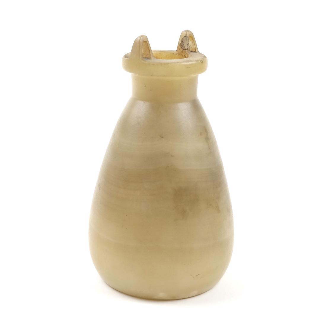 AN EGYPTIAN ALABASTER SITULA NEW KINGDOM, 1550-1070 BC: 6 1/2 in. high