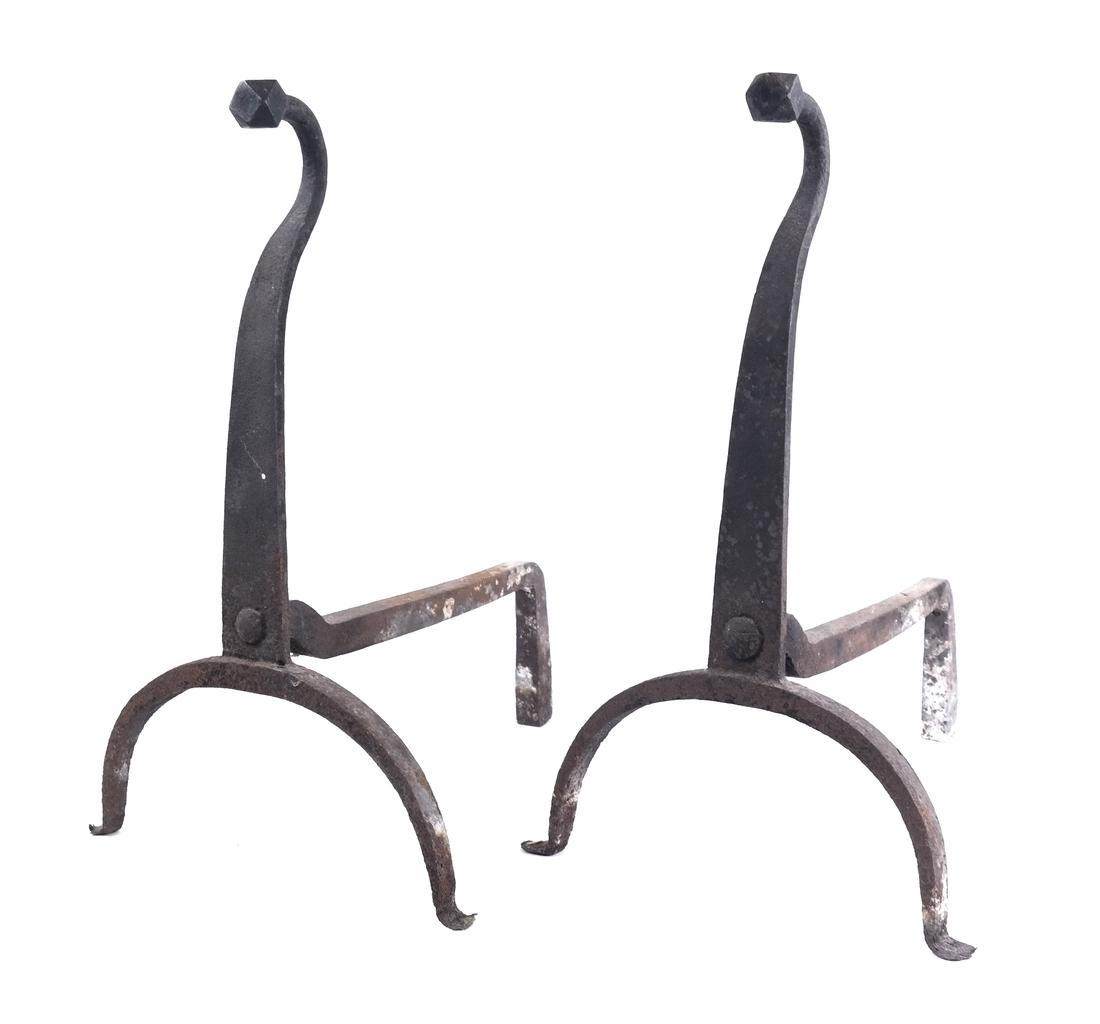 A PAIR OF ANTIQUE WROUGHT IRON ANDIRONS: A pair of American wrought iron gooseneck andirons. 9 1/2 in. high; 9 1/2 in. wide; 11 3/4 in. deep (each)