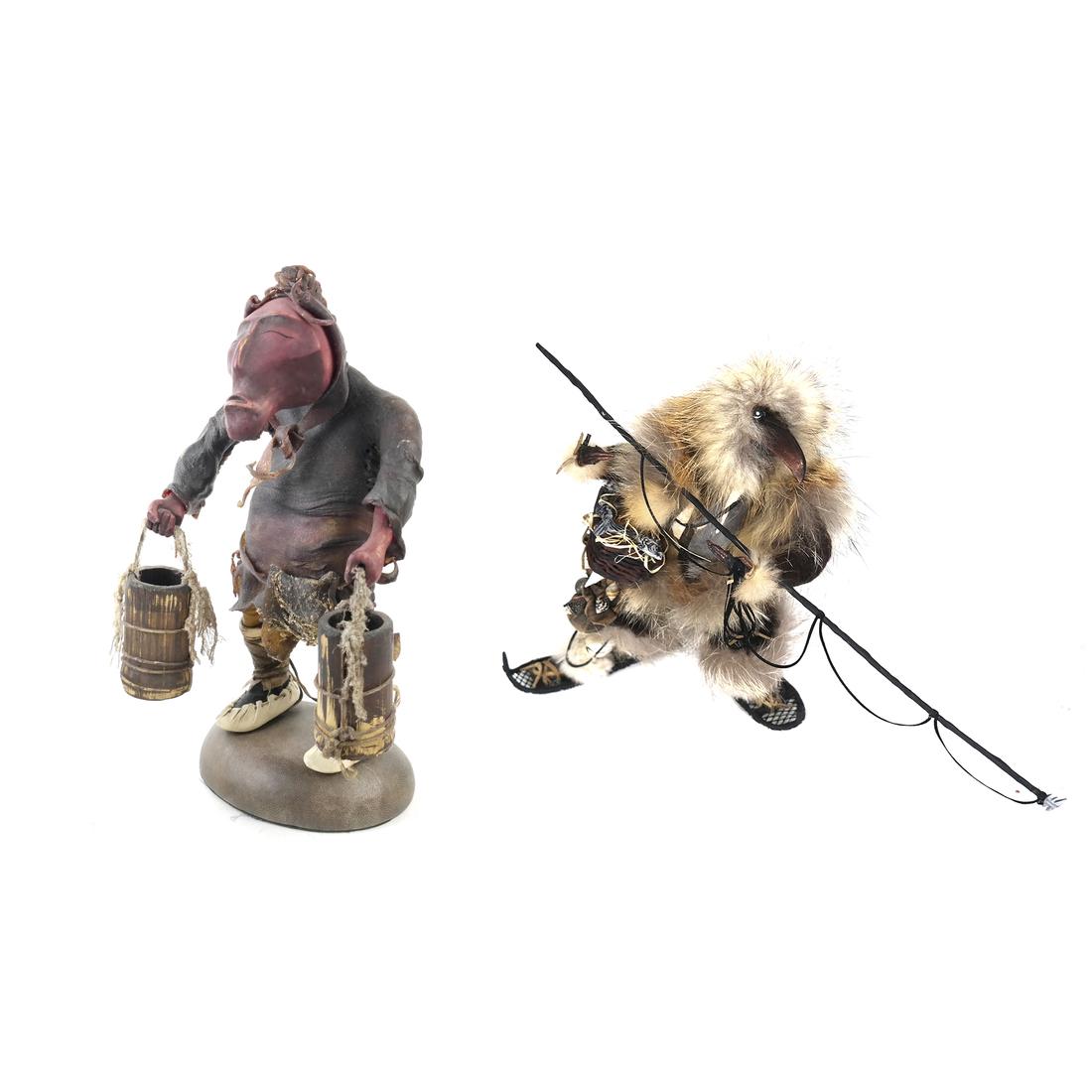 Two Northwest Coast or Inuit-Style Figures: Comprises: 1.) Sculpture modeled as wearing snowshoes and fishing. 2.) Sculpture modeled as carrying buckets. [9 1/2" and 11 1/2" H; 15" and 7" L].
