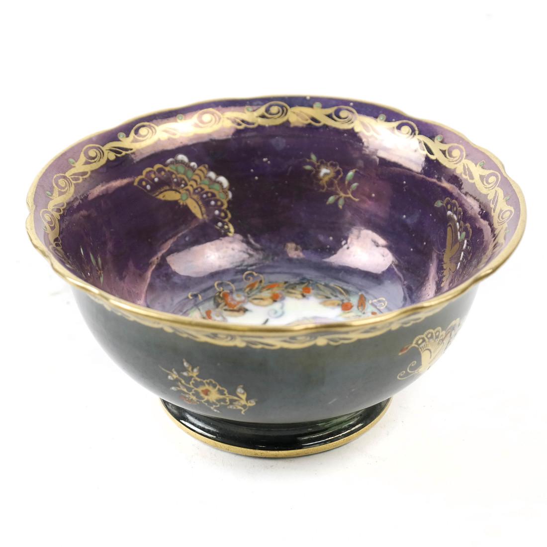 Minton Fairyland Luster Bowl: Porcelain bowl with luster glazes and gilt butterflies and squirrel, underside with red printed factory mark. [2 1/4" H x 5" Dia].