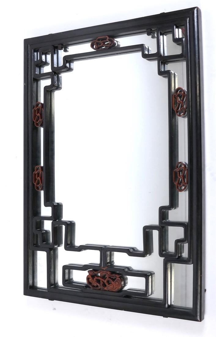 Chinese Hardwood-Mounted Mirror: Of rectangular form, carved with stylized knots. [30" H x 21 1/4" W]. Good overall condition.