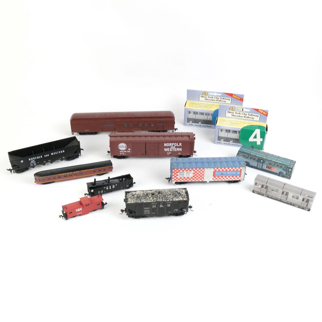 Lot of Toy Trains: Two NYC subway cars, "A" & "4" lines together with freight trains and more.