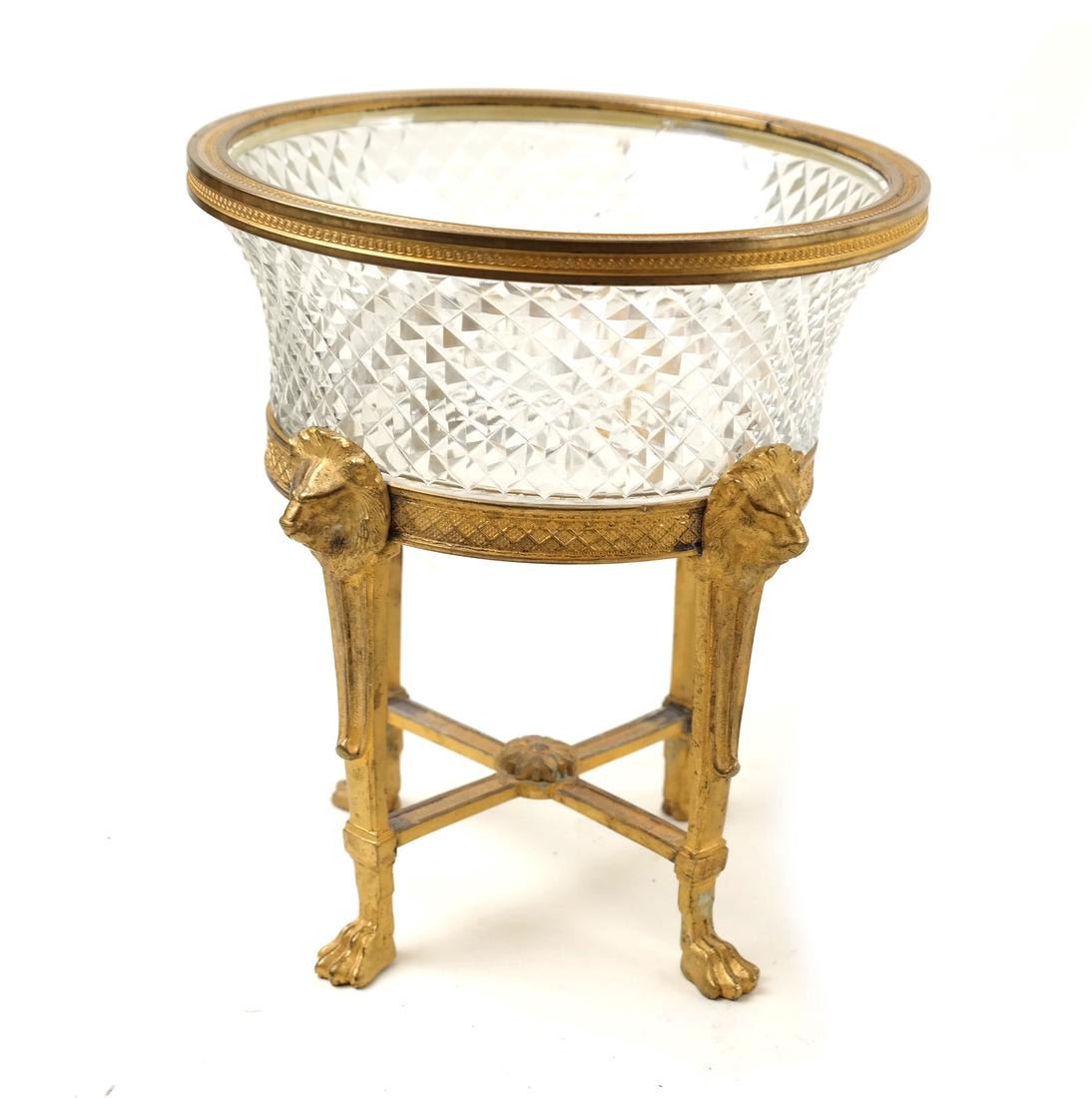 French Gilt Bronze Glass Compote: Glass bowl molded with lozenges, with gilt bronze mounts, the "X" form stand headed with lion's masks and the claw feet; [H: 6 1/4in; Greatest Dia: 5 3/4in]. Few minor areas of corrosion; Glass bowl "