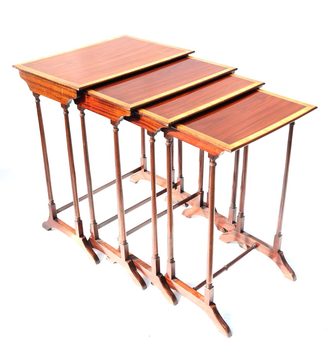English Banded Nest of 4 Tables: Nest of four mahogany and banded border tables. [Largest: 22" x 15 1/4" x 28" H].