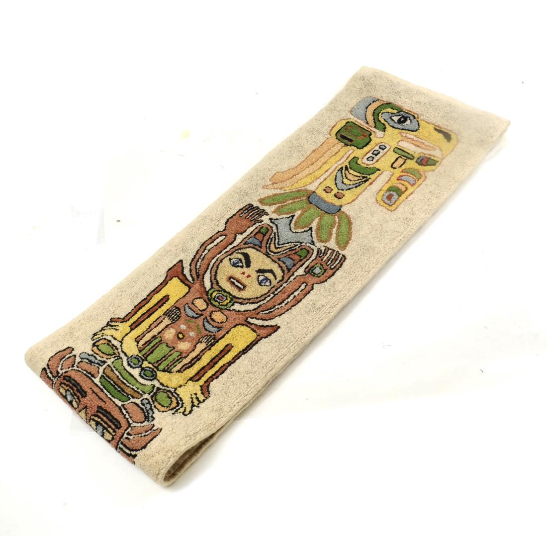 Northwest Coast Handmade Totem Tapestry: Embroidery depicting a totem pole. [55" x 10"].