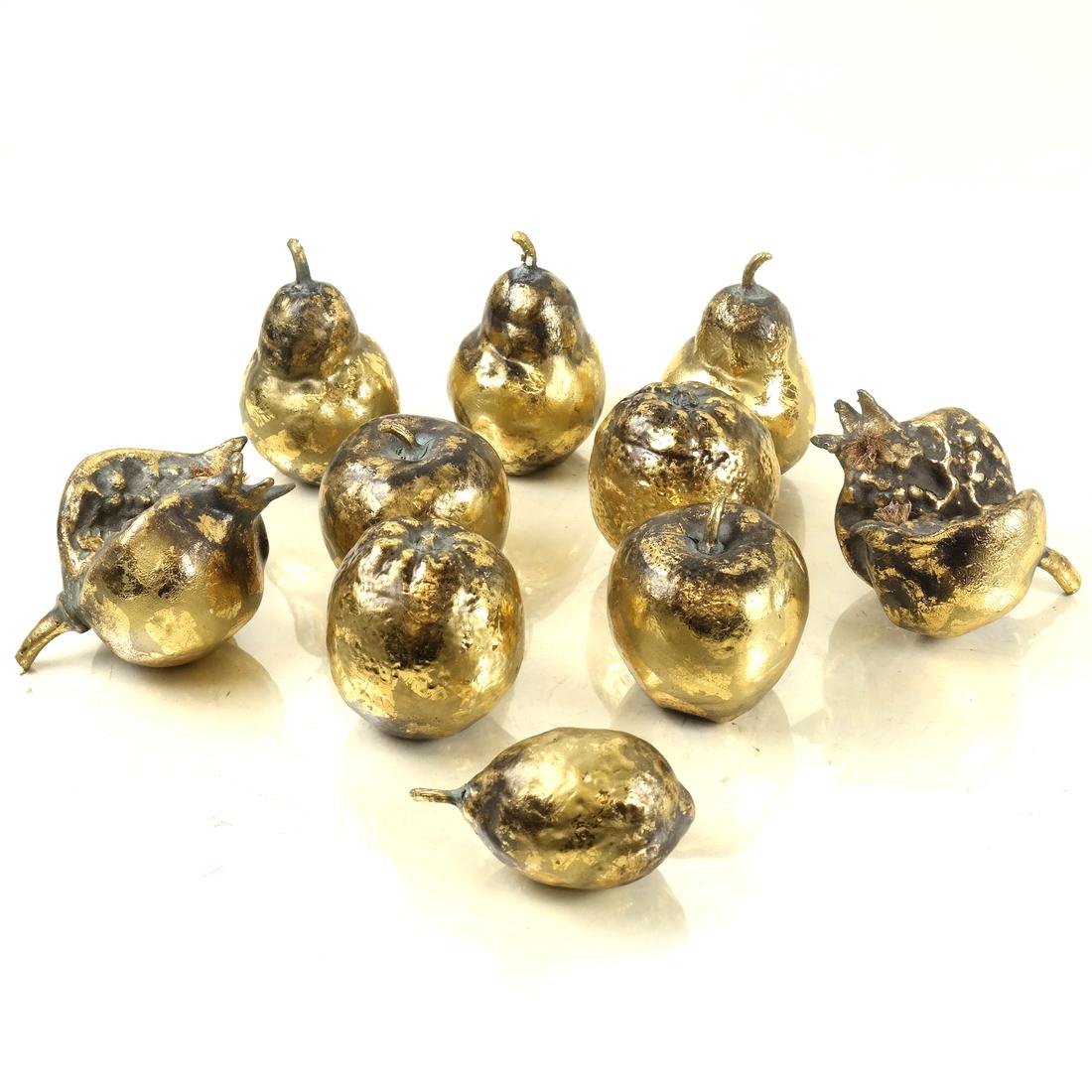 10 Gilded Fruit Sculptures: Comprises 10 various composite fruit sculptures that have each been gilded. Includes pears, pomegranate, apples and lemons.