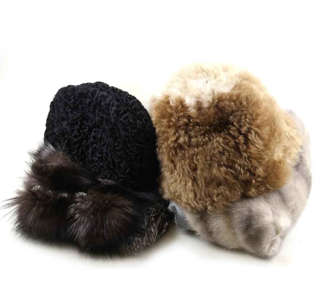 Vintage Fur Stoles & Hats: Comprises: 1.) Two llama hats, one off-white, the other orange. 2.) Mink Stole. 3.) Fox stole with paste stone accents. 4.) Black Persian lambs wool hat. Condition varies, all sold together "as is" wi