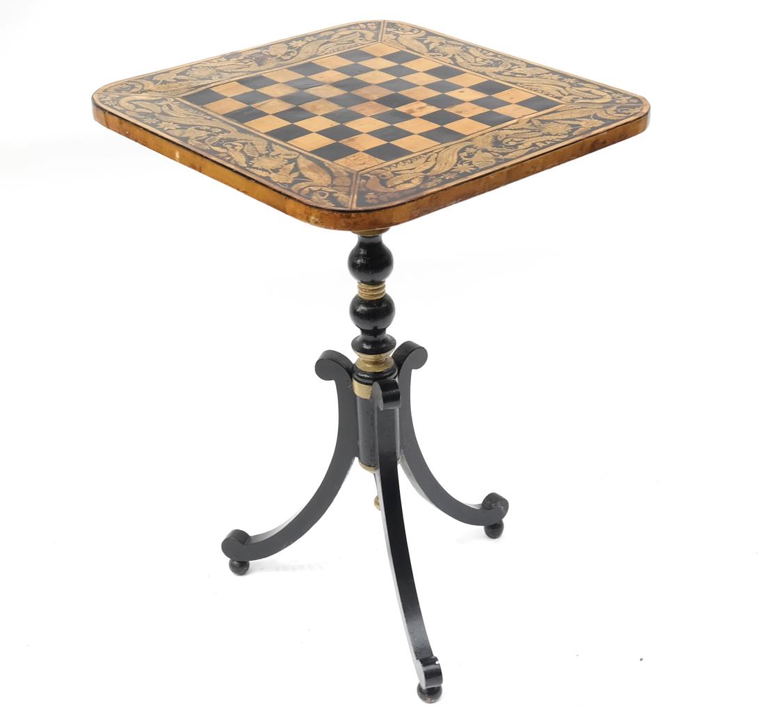 Victorian Penwork Tilt-Top Games Table: Early Victorian penwork decorated tilt-top games table, with tripod base. [20" x 20" x 29 3/4" H; 49" H Tilted]. Age consistent wear.