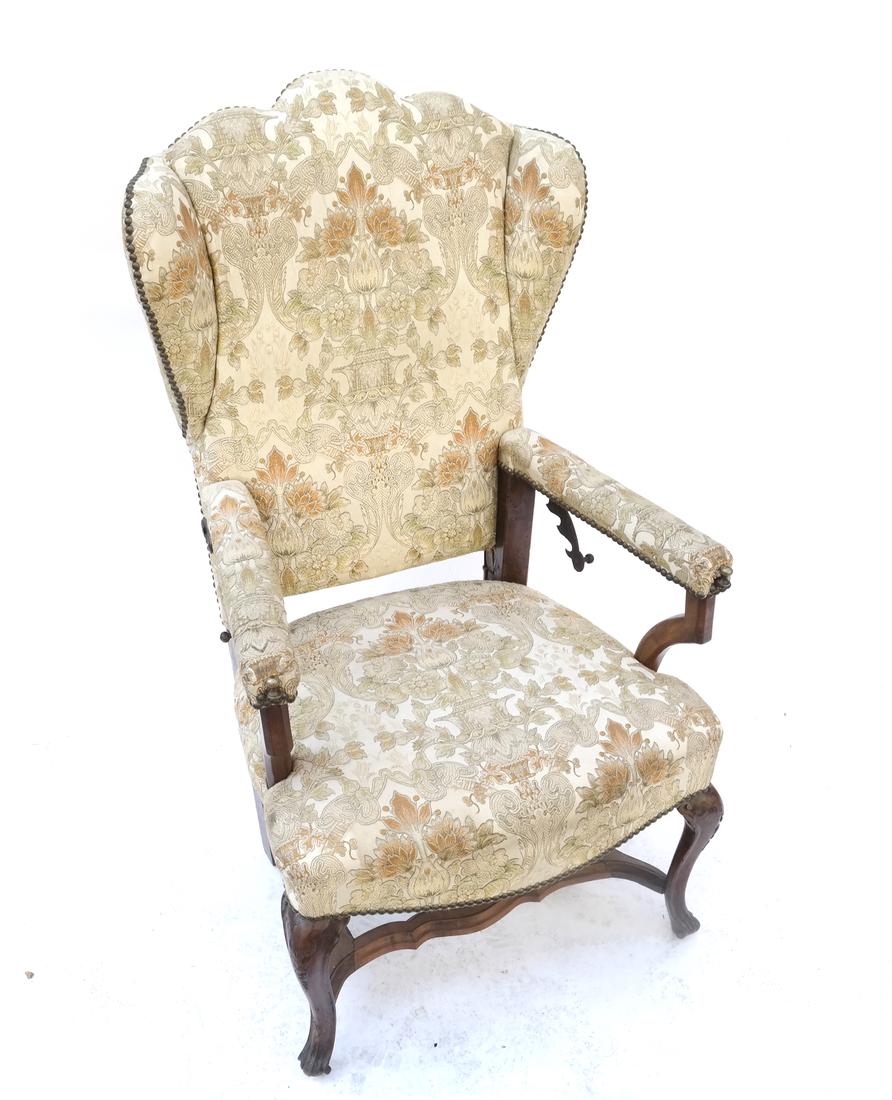 Antique Provincial Wing Wair: Antique Continental wing chair with iron pull out candle holder and side reclining mechanism. [26" W x 22 1/2" D x 47 1/2" H; 17" H to seat]. Age consistent wear.
