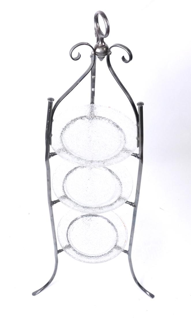 Silver-Plated Bon-Bon Server: Late 20th century three-tier server fitted with three molded clear glass separate dishes. [36" H x 14 1/2" W; Dish: 8 1/4" Dia]. Few dents and some light wear overall, lacking screw.