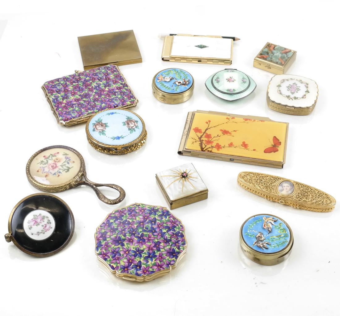 15 Miscellaneous Compacts or Similar: Early 20th century and later, also including note pads or cigarette boxes; various decorated; [L: 2 1/2in to 4 3/8in]; All with some wear, sold "as is".