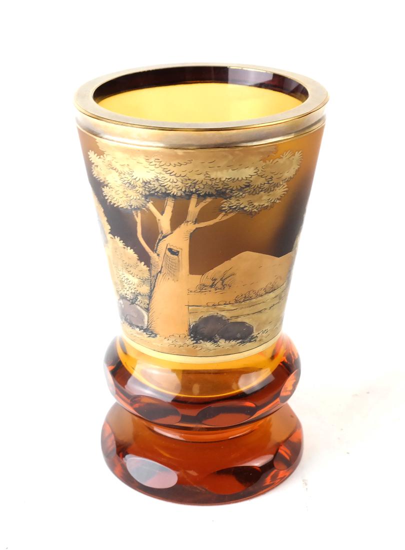 Bohemian Gilt Decorated Glass Beaker: Early 20th century with continuous coaching scene border. [5 1/2" H x 3 1/2" Dia]. Few minor losses, minor wear overall.