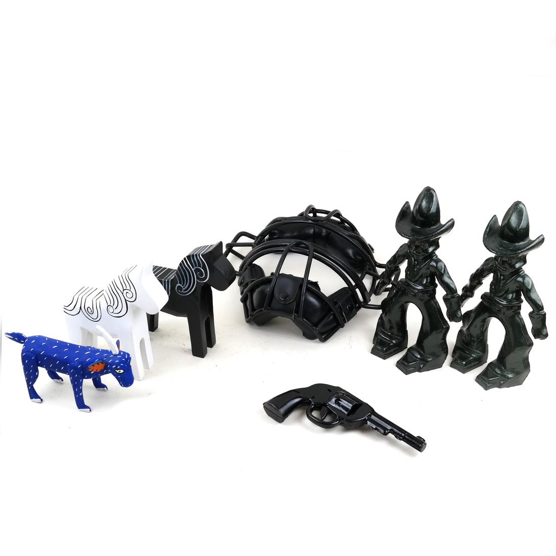 Group of Toys and Amusements Items: Comprises: 1.) Vintage baseball catcher's mask. 2.) Black painted metal toy revolver. 3.) Pair of rubberized comical cowboy figures from carnival bag toss game. 4.) Two painted wood horses and a fanta