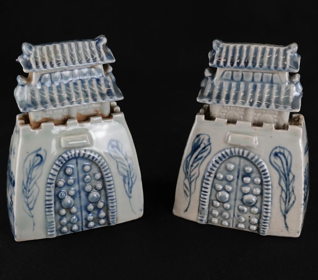 Pair of Chinese Porcelain Houses: Pair of Chinese blue and white porcelain houses. [6 1/2" H x 4 1/2" W x 3" D]. Surface grime and minor chips.