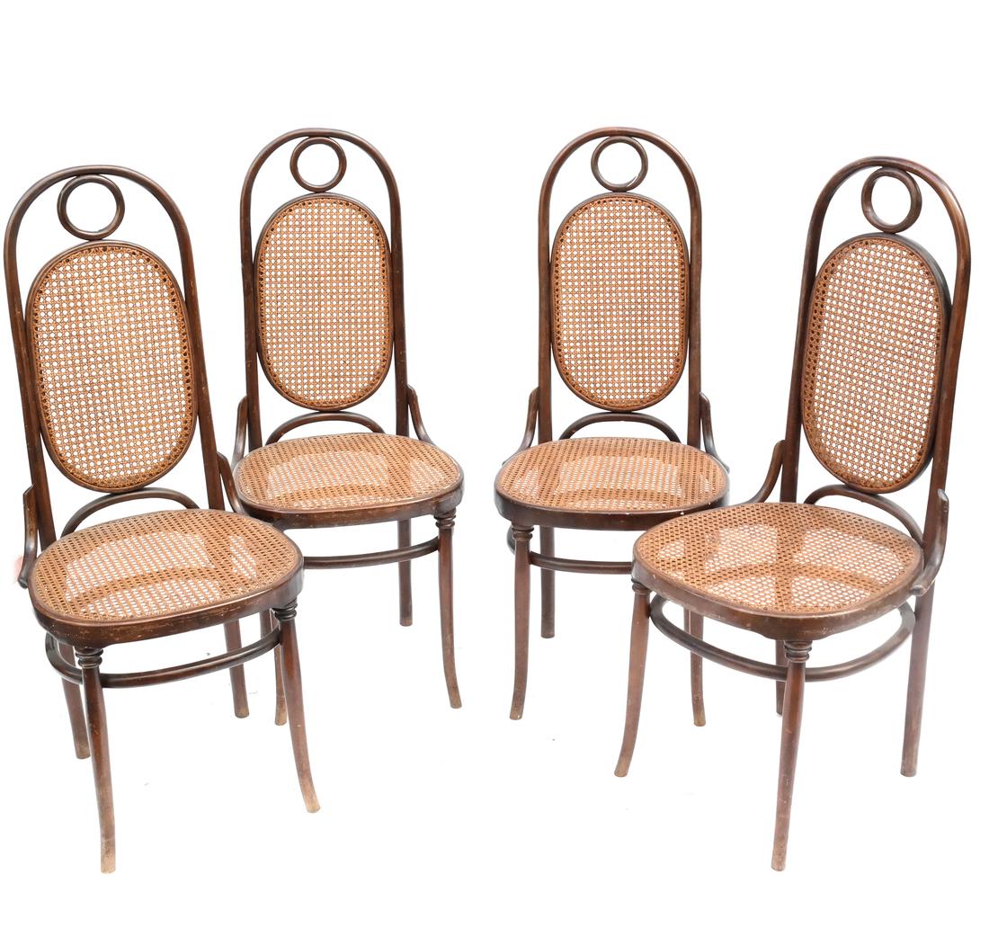 Four Thonet Style Chairs: Each with a canned back and seat. Bearing an "S & L" label. [43" H x 18" W x 19" D; Height to seat: 18"].