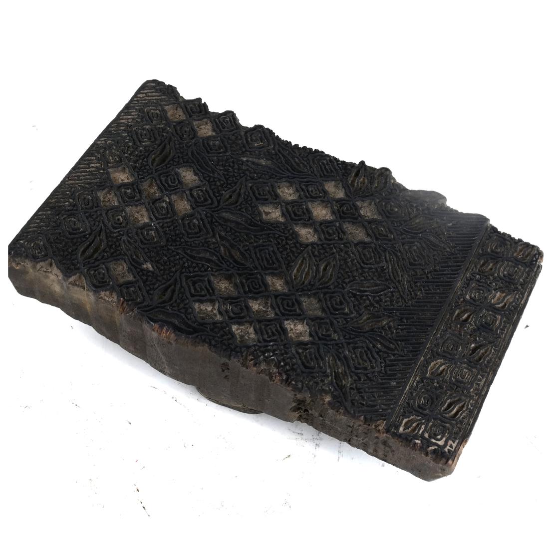 An Antique Wood Stamp: An antique wood stamp. [5 1/4" x 8 1/4" x 3"]. From the Collection of Will Barnet