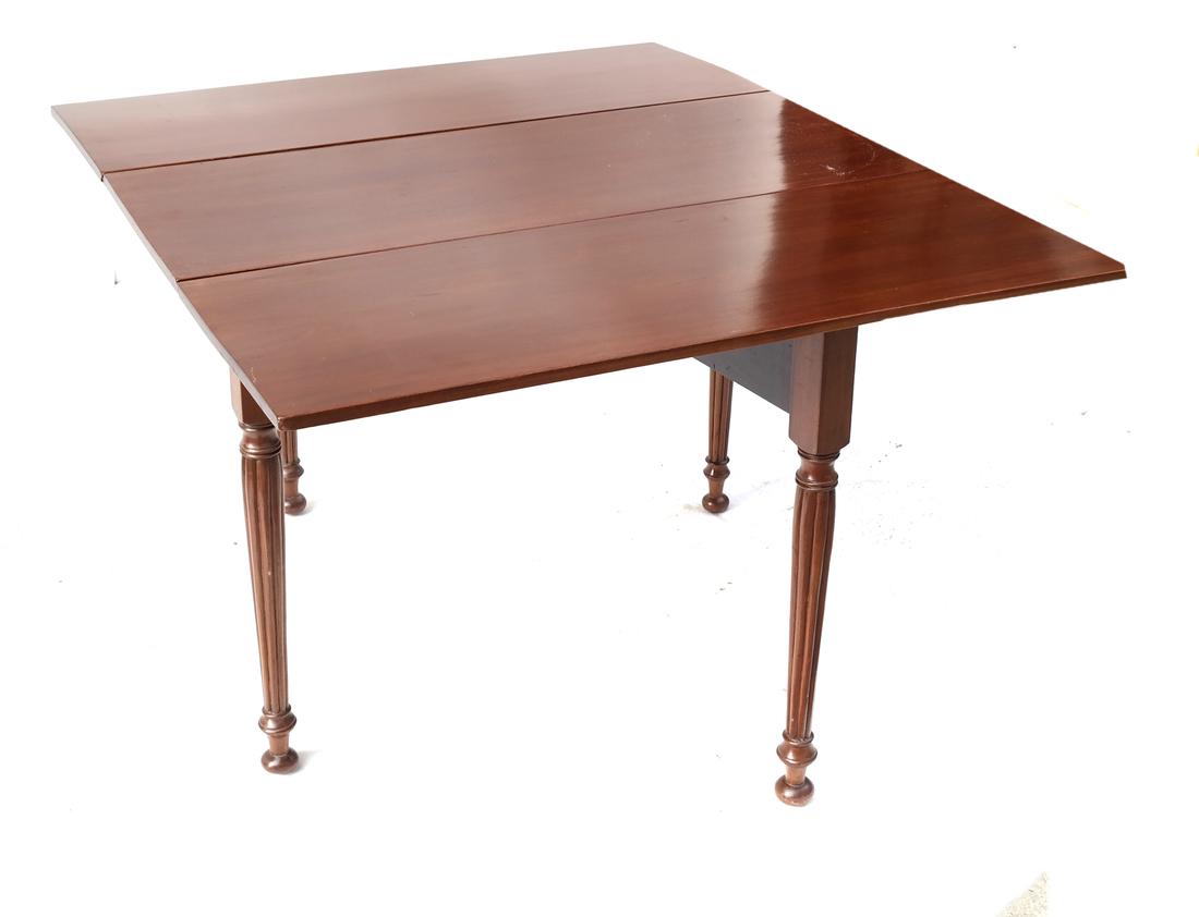 English-Style Drop-Leaf Table: Mahogany drop-leaf table with reed-form legs. [42" x 18" D x 29" H; Leaves: 16" x 2"]. Good condition.