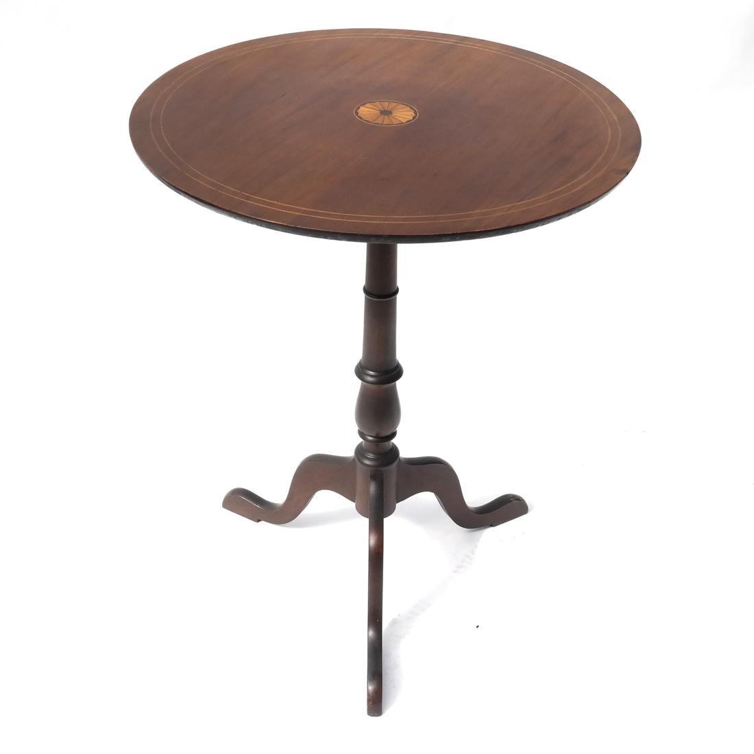Sheraton-Style Tilt Table: Circular form, on a tripod base, the table having inlaid banding and a central fan-form medallion. Dimensions: 24" ⌀ x 30" H; 