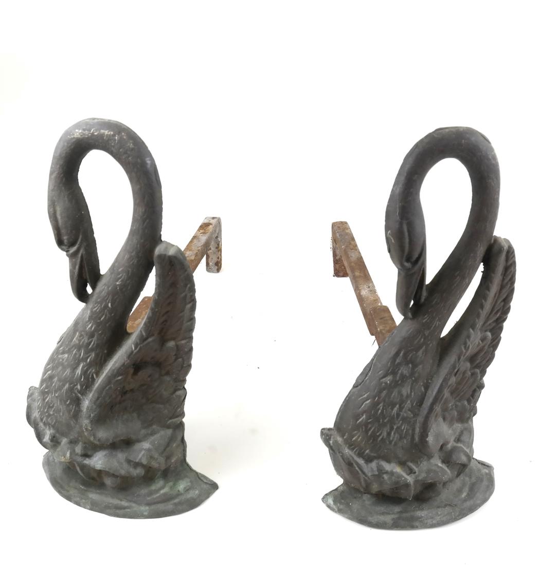 Pair of Iron Swan Form Andirons: Pair of cast iron swan-form andirons. [13 3/4" H x 7" W x 17" D]. Wear.