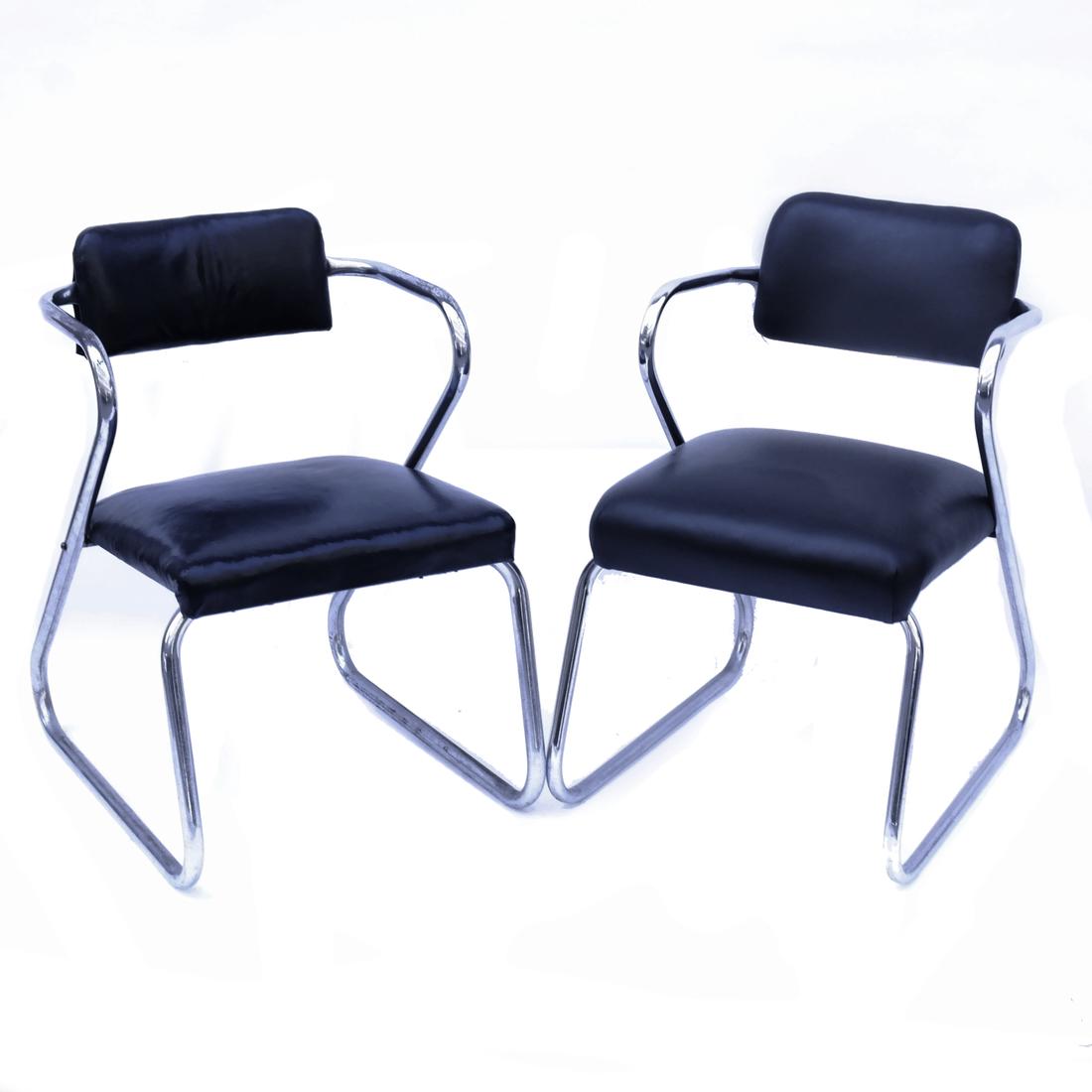 Pair of Alice Roth Side Chairs: Tubular steel frames with black vinyl upholstered backs and seats. Manufactured by Troy Sunshade Co. Dimensions: 19" W x 22" D x 30"H each ; to