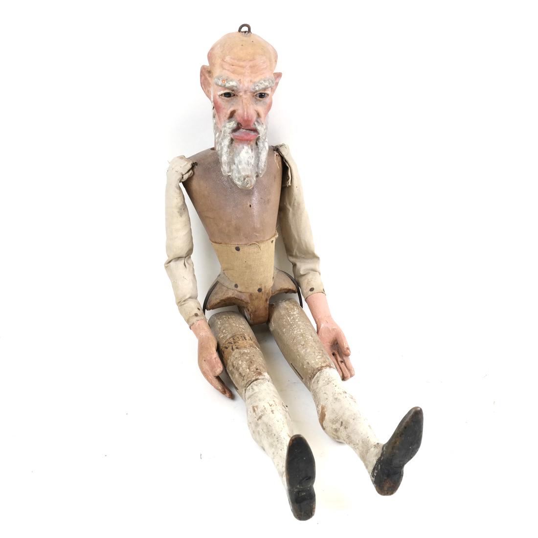Antique Wood Hinged Puppet: Puppet of an elderly man with hinged joints. Dimensions: 24" H x 6" W; 