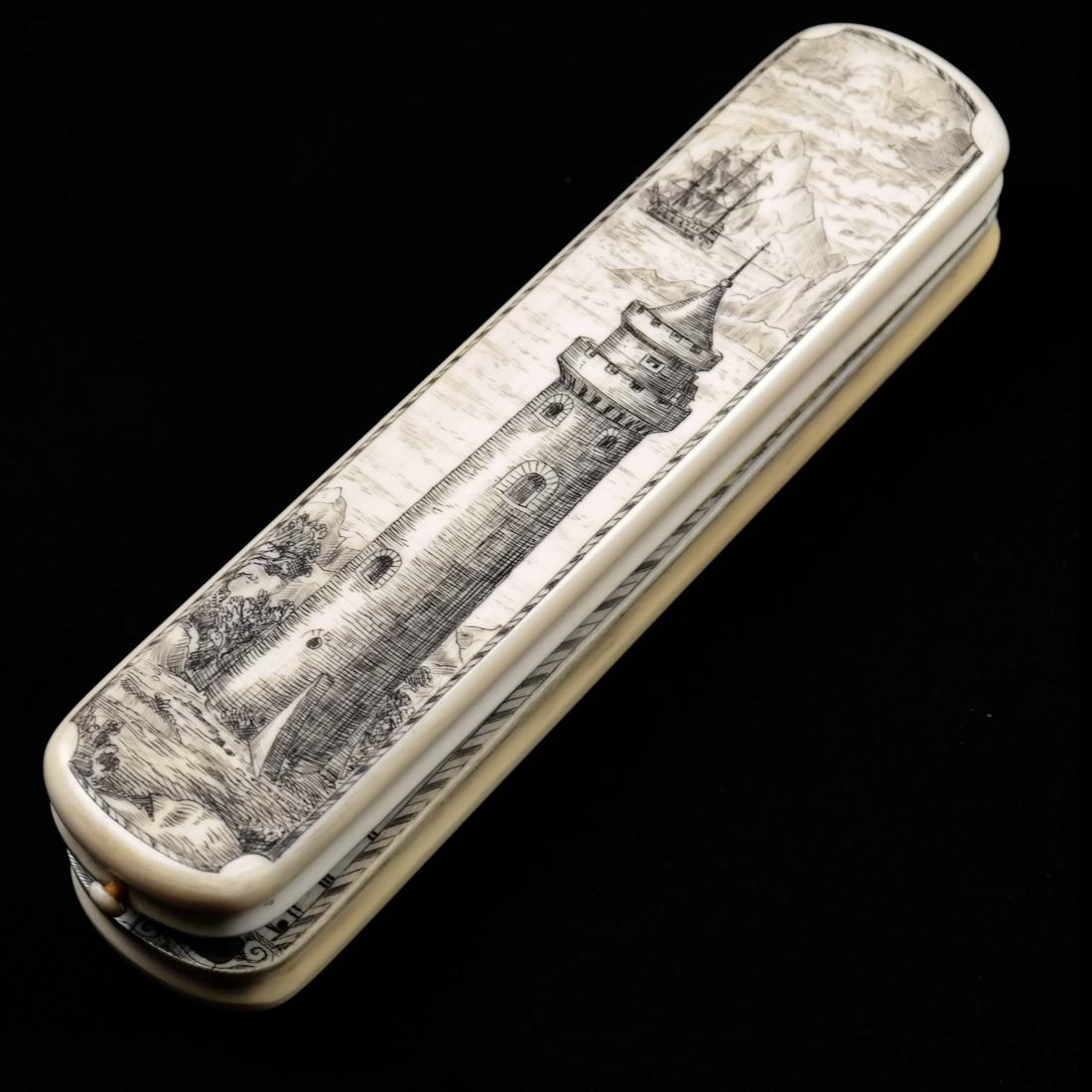 Scrimshaw Nautical Instruments in a Box: Having a lighthouse on top and signed on bottom. Signed P.H. Eron Brass Socies. Dimensions: 6.5" L ; 