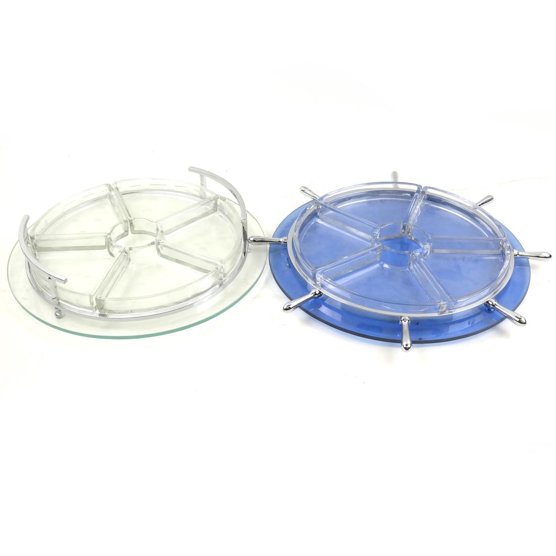 Two Modern Hors D'oeuvres Dishes: 1.) Blue colorless glass with chrome accents in the form of a ships wheel. 5 compartments. 2.) Clear etched colors glass and chrome accents. 5 compartments. Dimensions: 3" H x 13.5