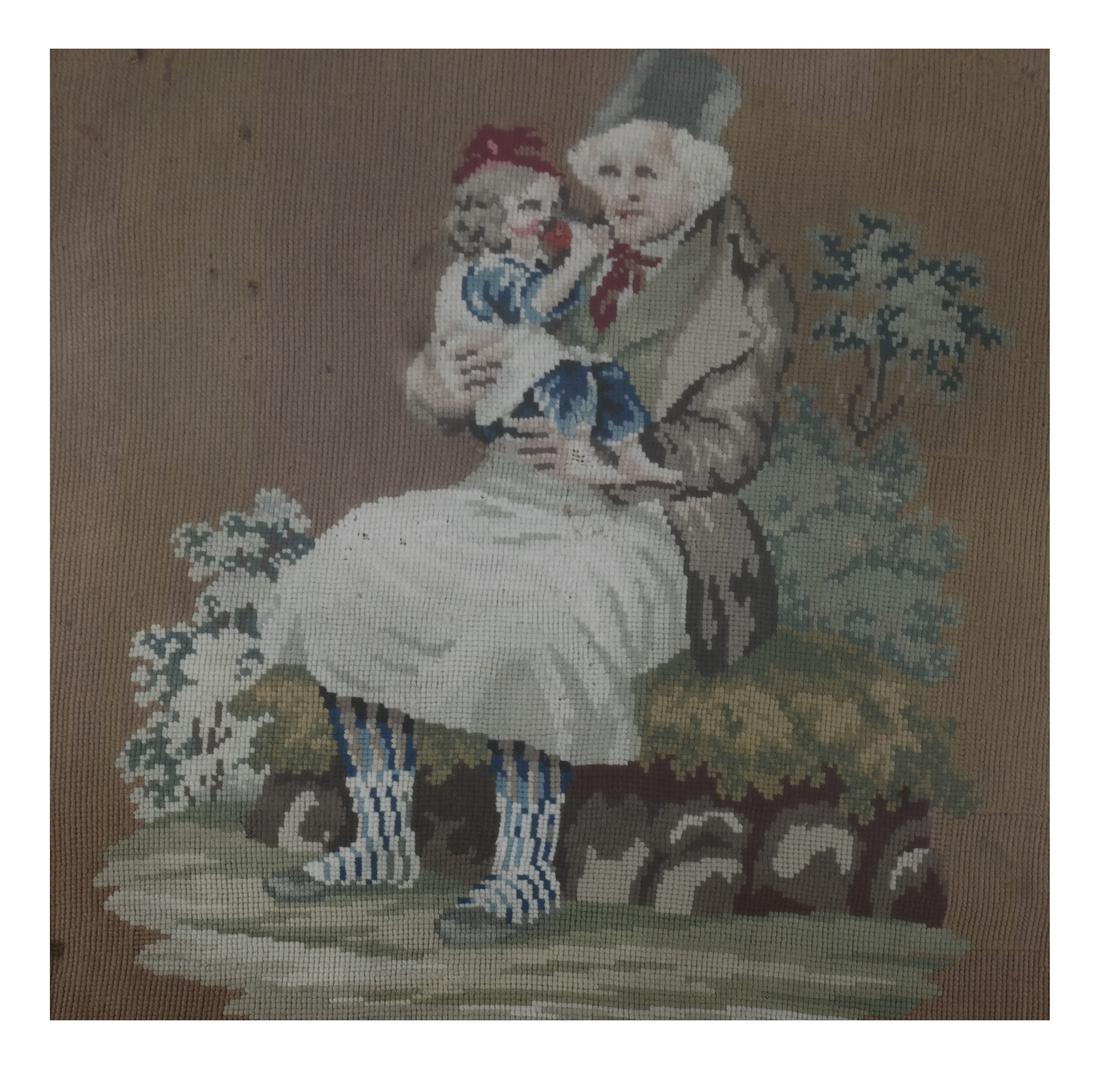 Framed Needlepoint, Father and Child: Framed needlepoint depicting a father and child.