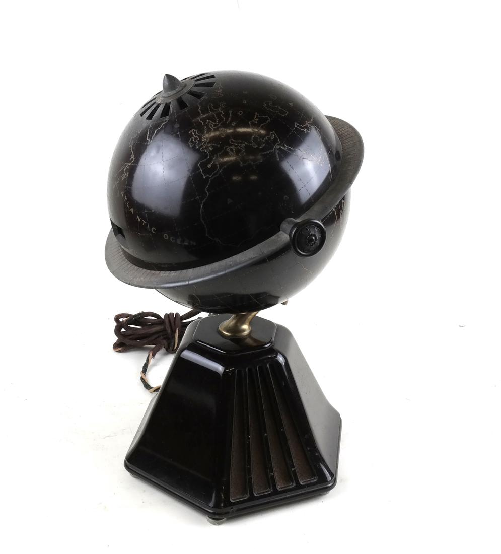 Raymond Loewy "New World" Globe Radio: Brown Bakelite globe, designed by Raymond Loewy in 1933 and manufactured by Colonial Radio Corporation. With metal and fabric elements. Dimensions: 15.5" H x 12" W x