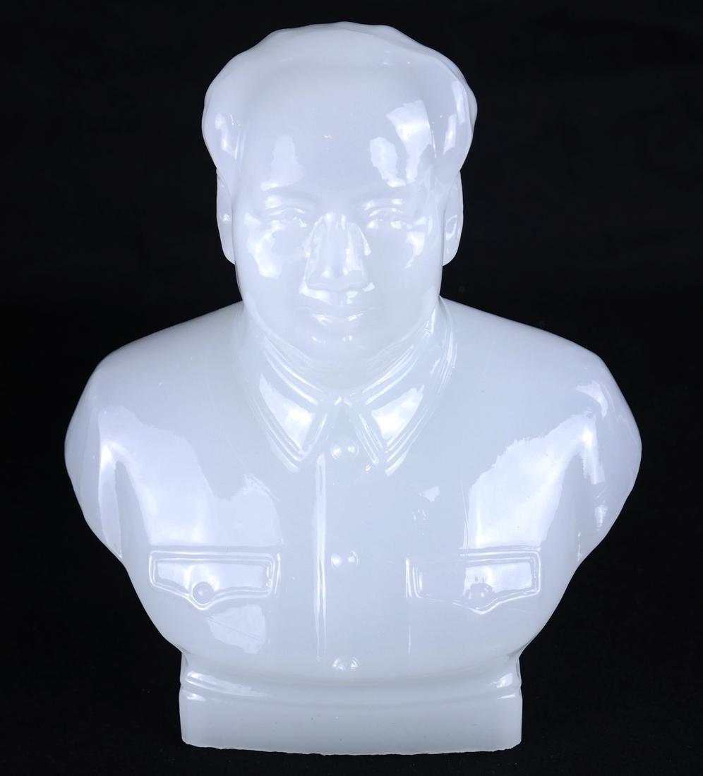 Chinese Molded Glass Mao Bust: Second half of 20th century, molded portrait bust of Chairman Mao Zedong. [9" H x 8" x 3 1/2" D]. Base edge is rough all around.