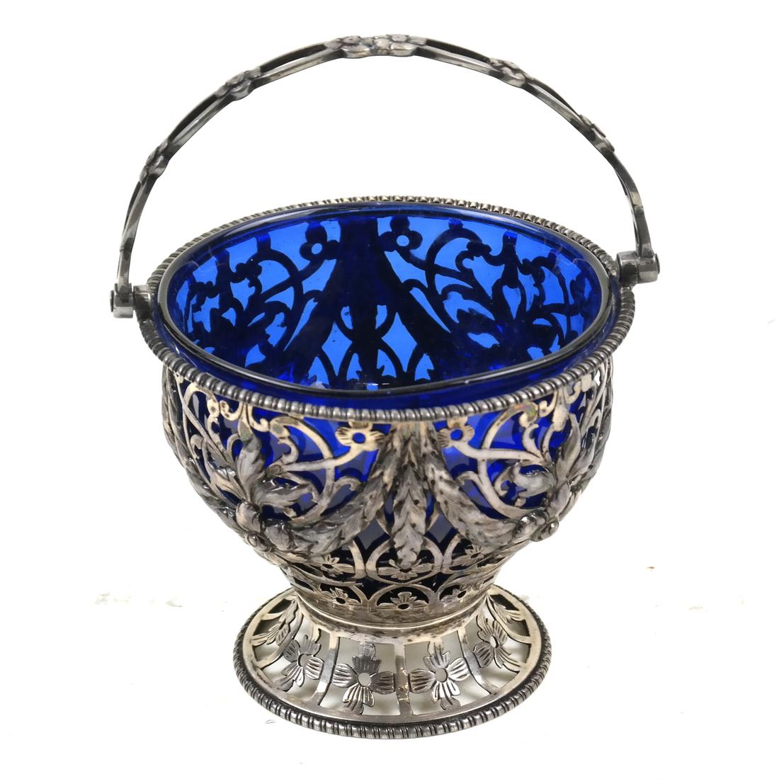 English Silver Salt Cellar with Cobalt Liner. 3.2 ozt.: English repoussé and reticulated salt cellar with cobalt liner. 3.2 ozt inclusive.