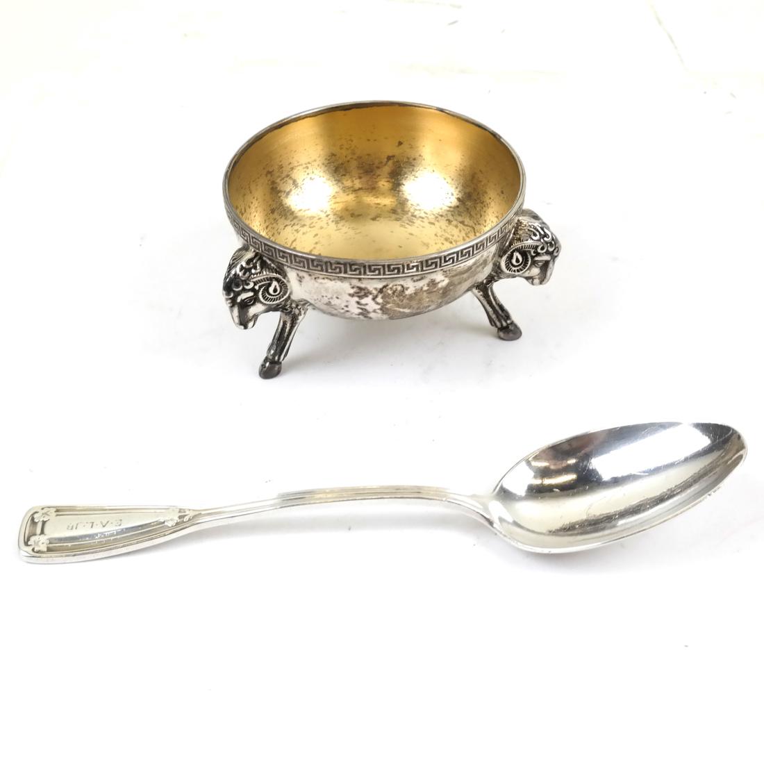 Sterling Silver Tiffany & Co. Salt & Spoon: Sterling silver Tiffany & Co. salt cellar and spoon with a ram motif. 3.3 ozt.
