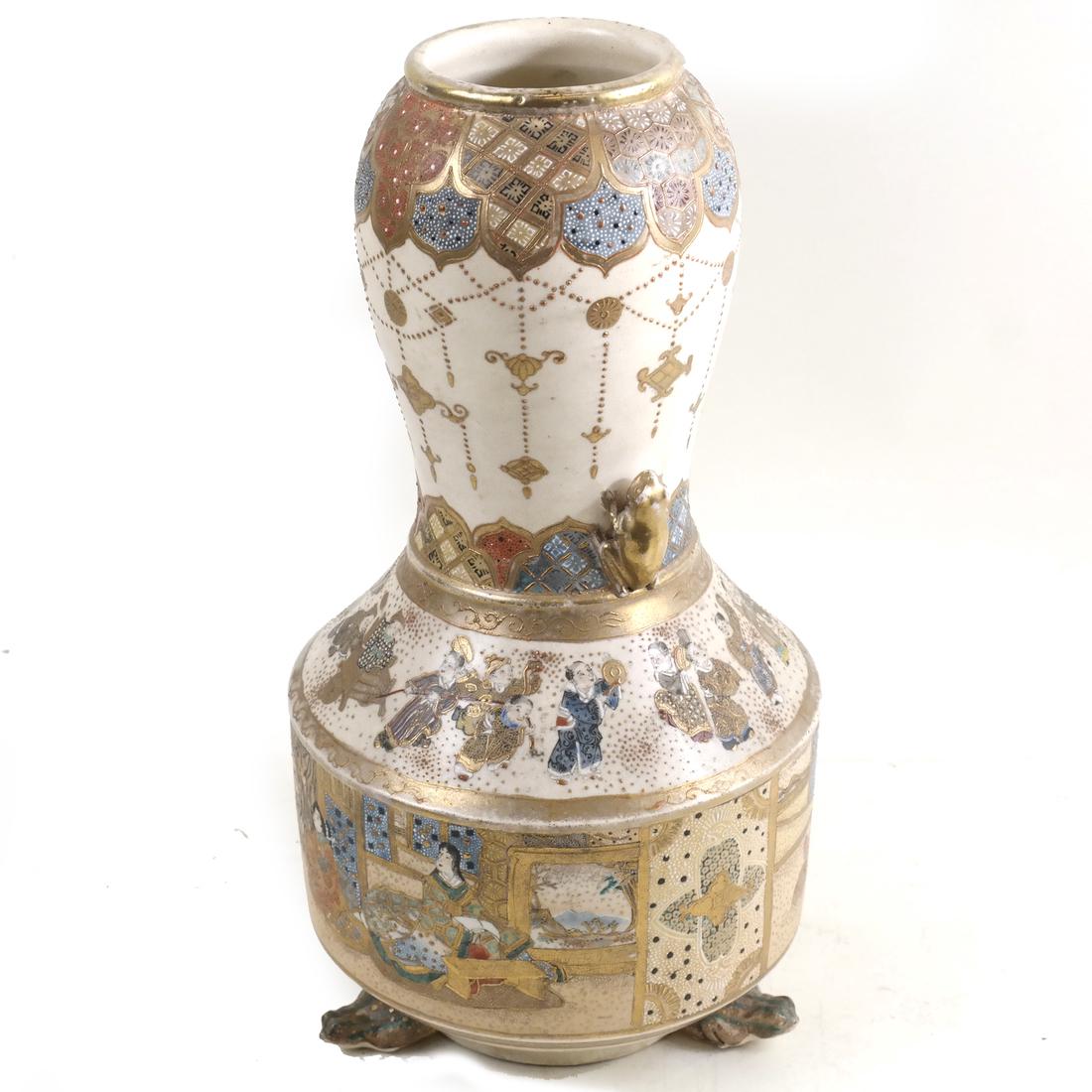 Japanese Satsuma-Style Earthenware Frog-Footed Vase: Meiji period, late 19th/20th century, enameled and gilt with borders of brocade, figures in interiors, applied with frog-form handles and three feet, underside of base with impressed Satsuma TJ mark. 