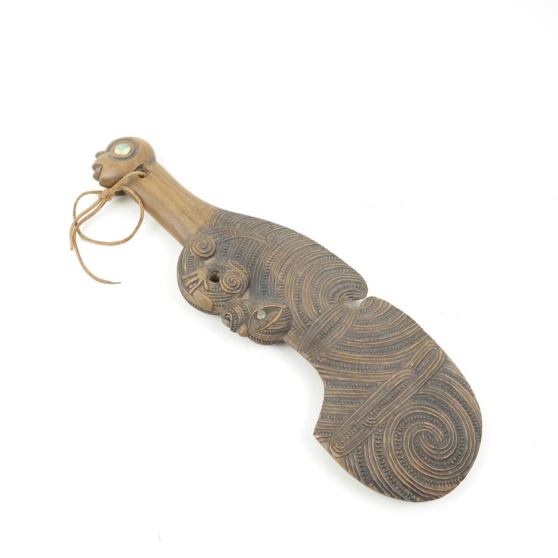 Maori Carved Wood Club: Maori carved figural club. Dimensions: 13.5" L ; 